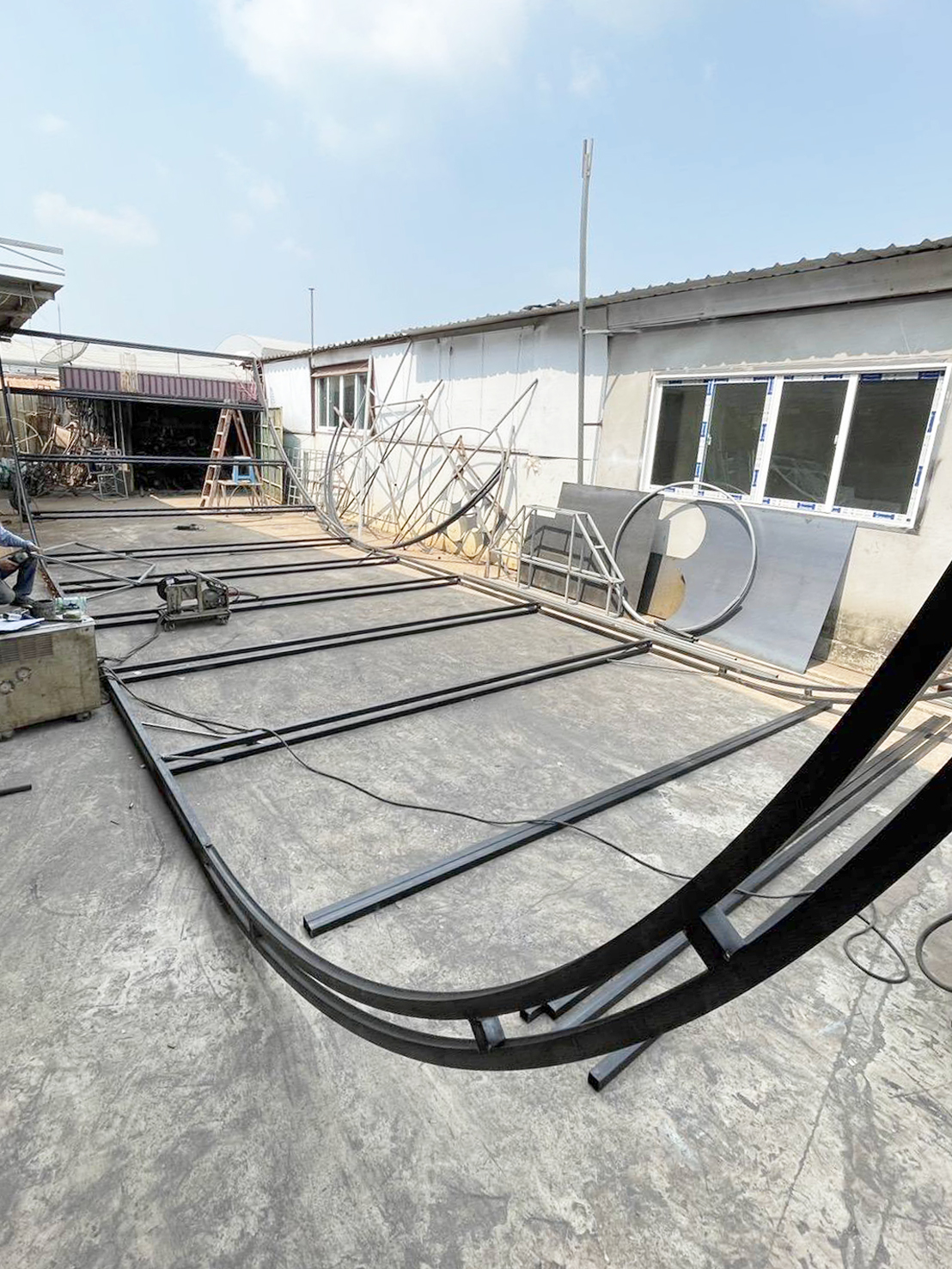 Curved steel frames at workshop